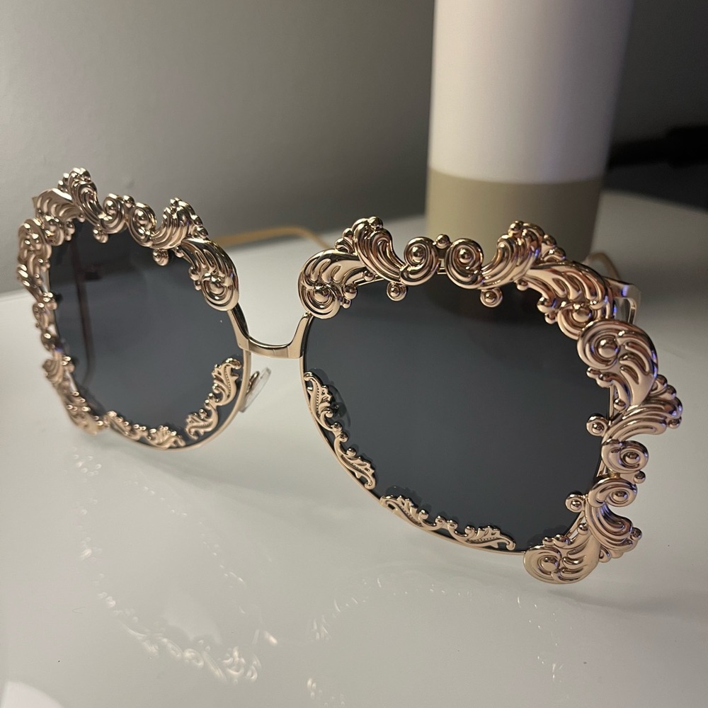Oversized gold sunglasses